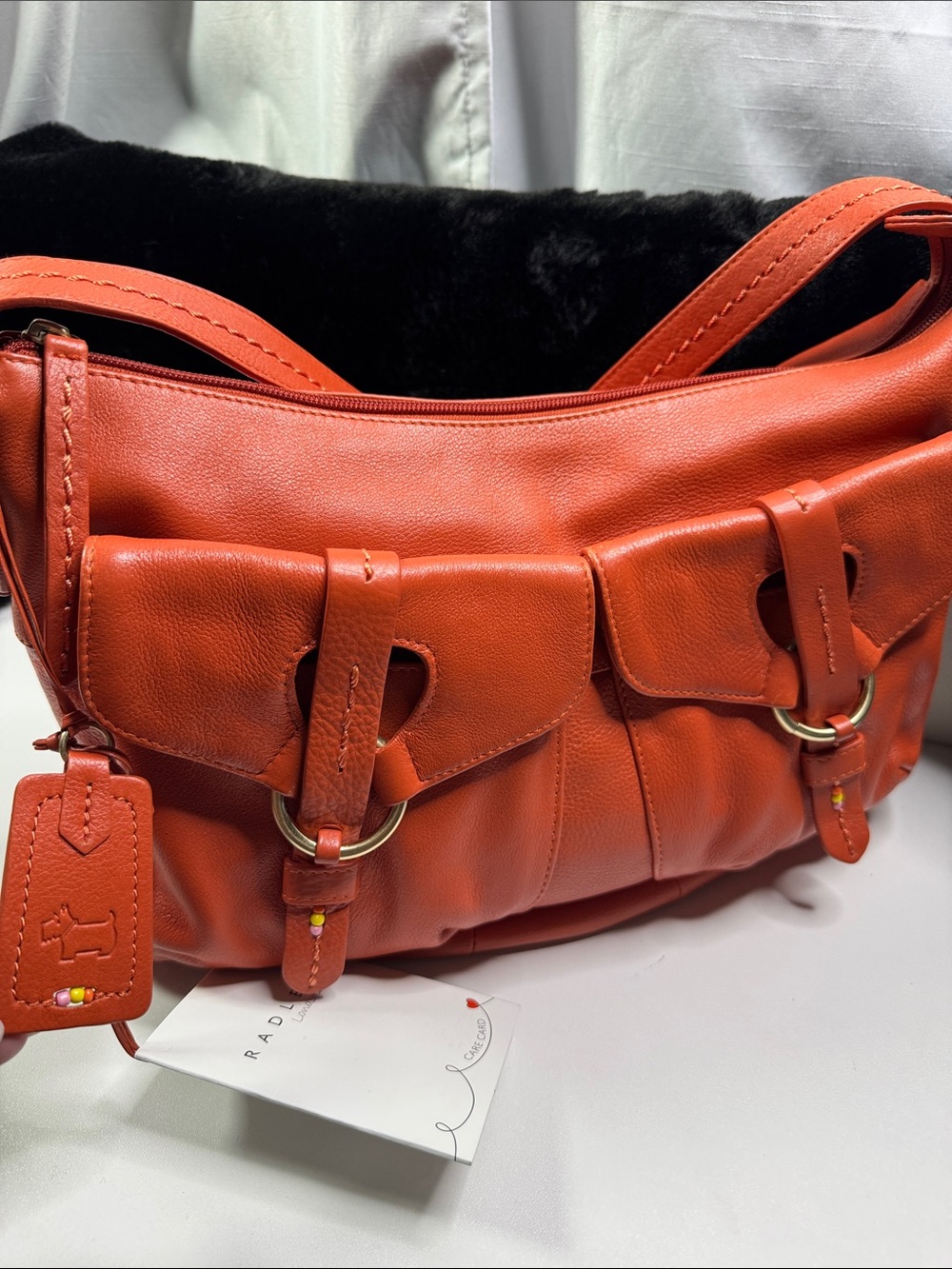 RADLEY LONDON Orange Leather Shoulder Bag with Front Buckle Pockets